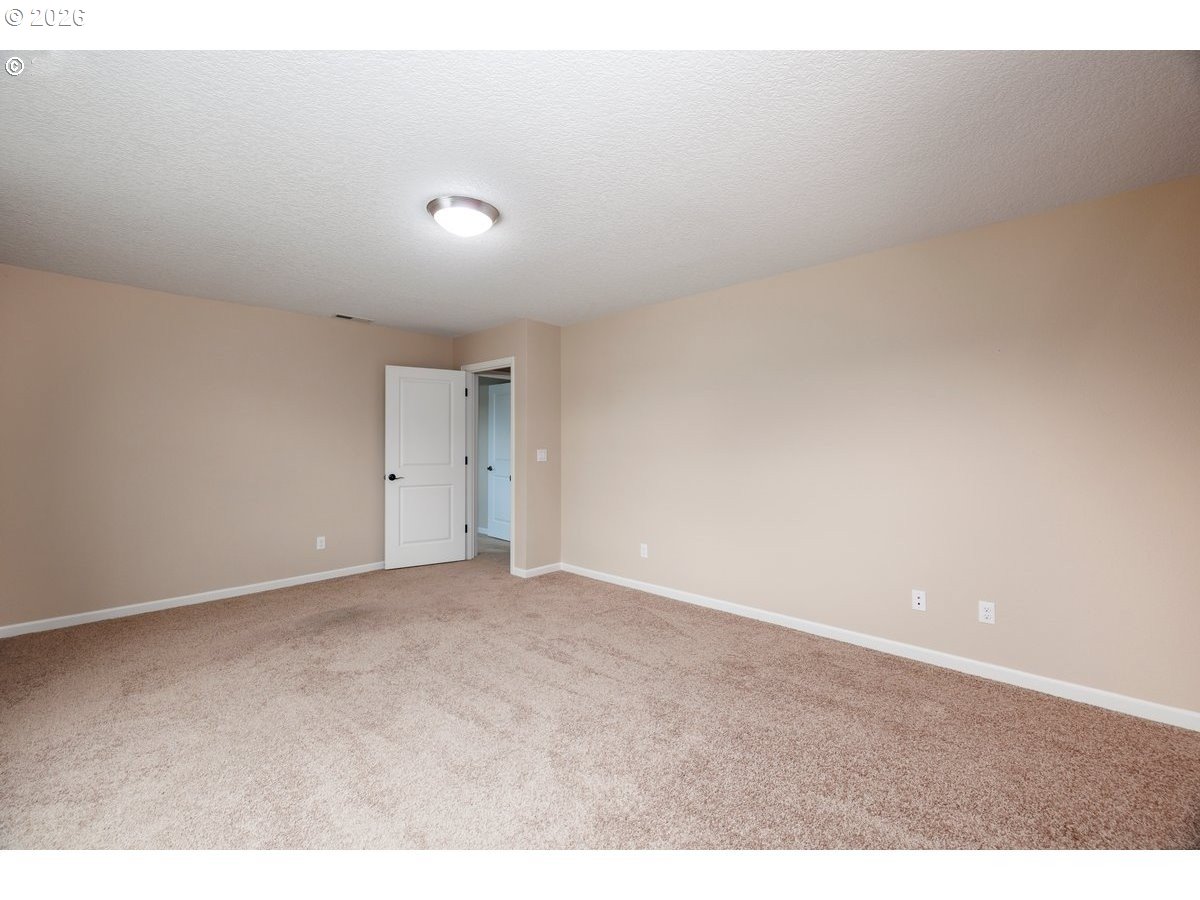 15997 Northwest Rossetta Street Portland, OR 97229 - Photo 32 of 36 a view of an empty room