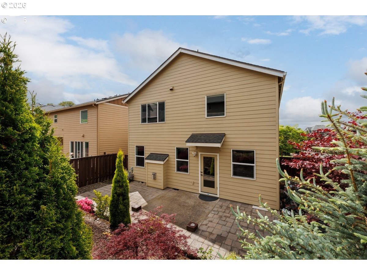 15997 Northwest Rossetta Street Portland, OR 97229 - Photo 35 of 36 a view of a back yard of the house