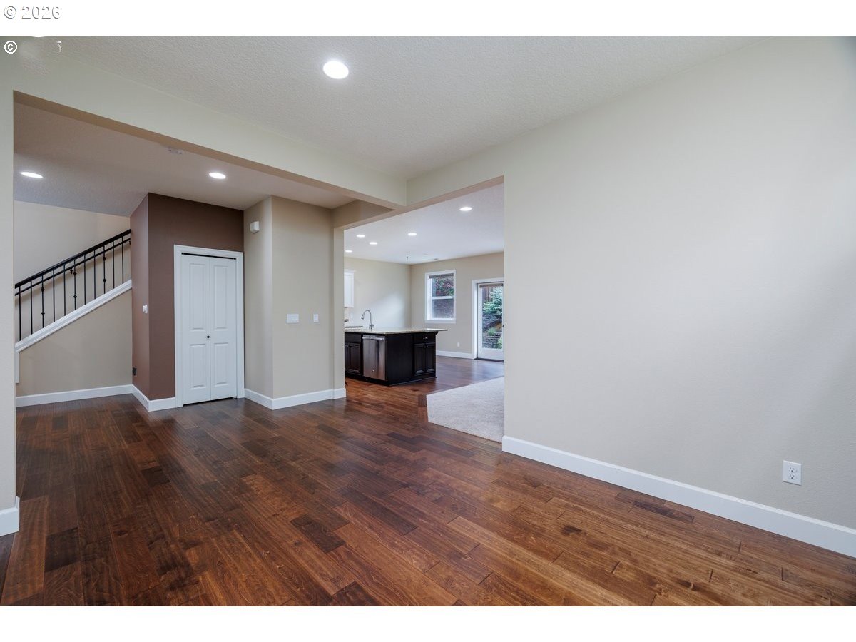 15997 Northwest Rossetta Street Portland, OR 97229 - Photo 8 of 36 a view of empty room with wooden floor