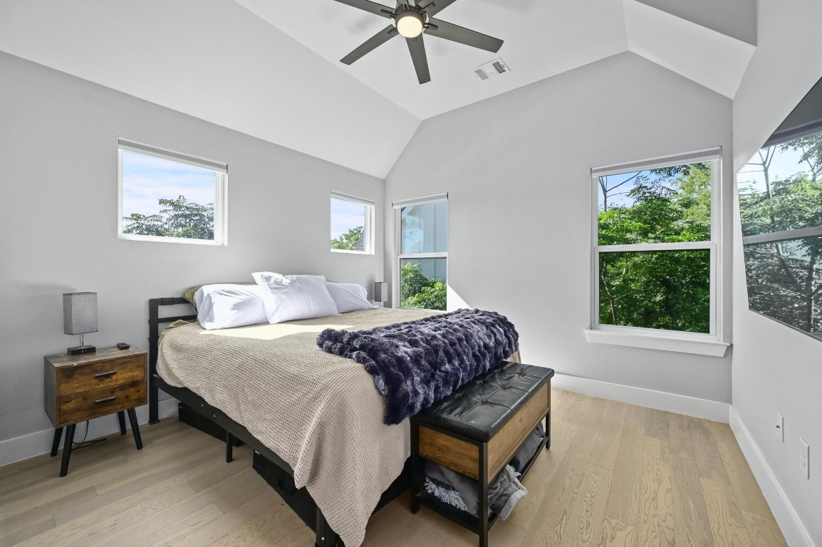 1210 Luna Street, Unit 2 Austin, TX 78721 - Photo 17 of 28 a bedroom with a bed and a window