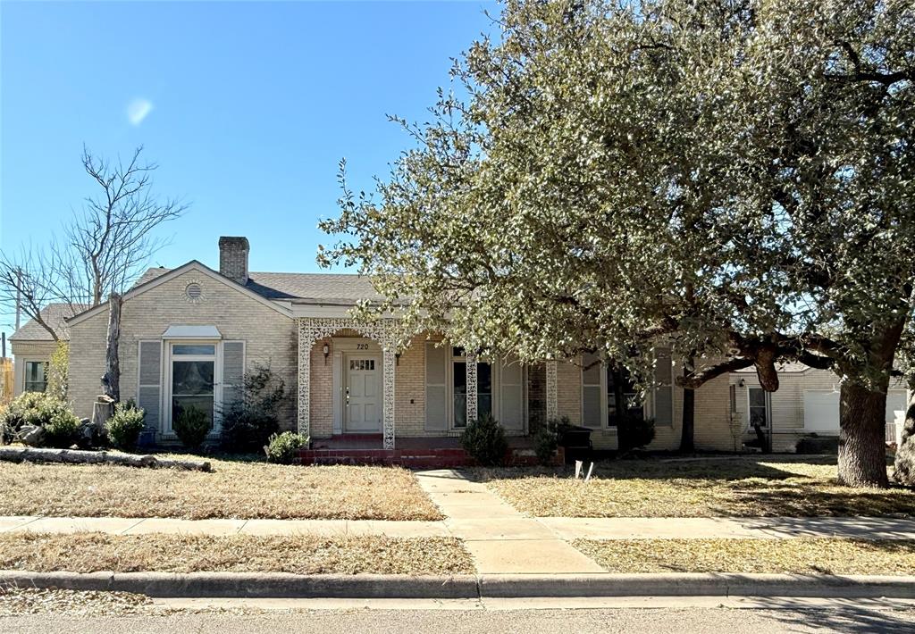 720 East Leslie Street Hamilton, TX 76531 - Photo 1 of 31 a front view of a house with a yard