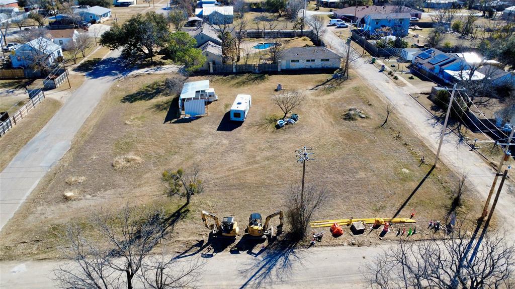 720 East Leslie Street Hamilton, TX 76531 - Photo 29 of 31 an aerial view of a large parking space