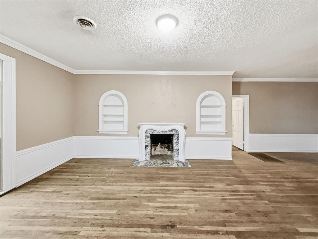 720 East Leslie Street Hamilton, TX 76531 - Photo 4 of 31 a view of a livingroom with a fireplace