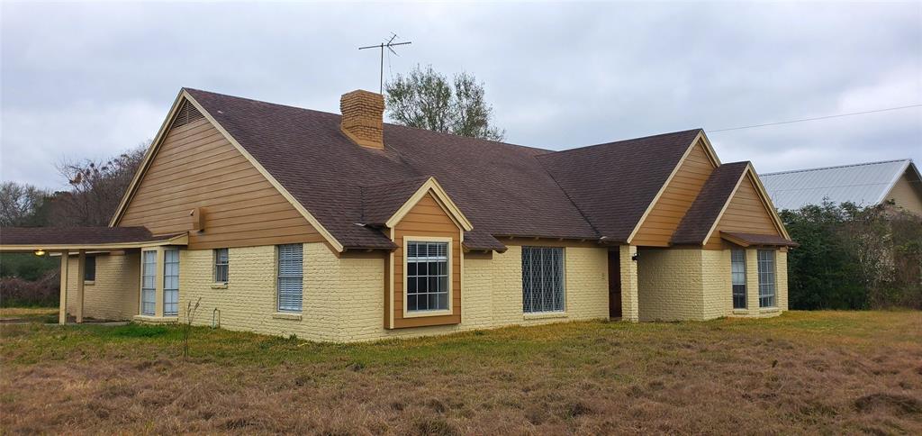 Completely renovated, one story, 4/4 home that sits on 7 acres of land