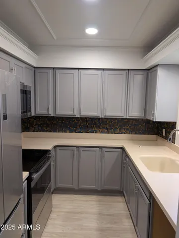 a bathroom with a sink and a bathtub