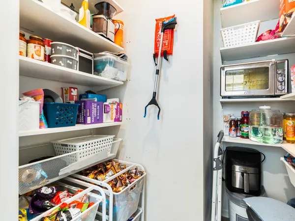 a room with furniture and storage