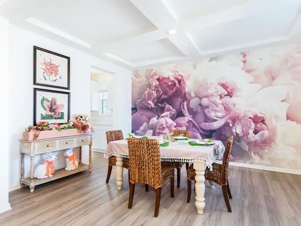 a view of a dining room with furniture and wooden floor