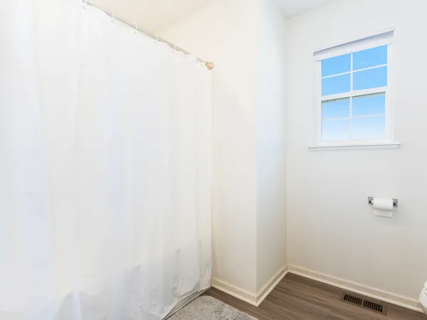 a view of a room with racks on the wall