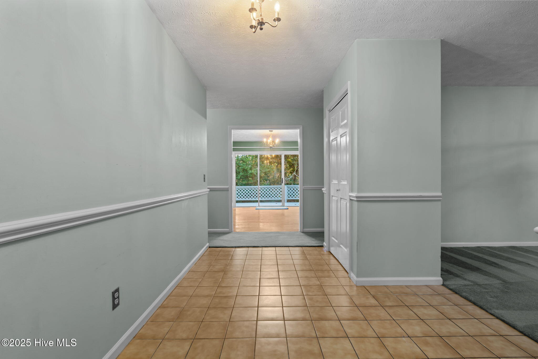 150 Pebble Beach Place Southern Pines, NC 28387 - Photo 10 of 55 View from the front foyer all the way to the rear deck