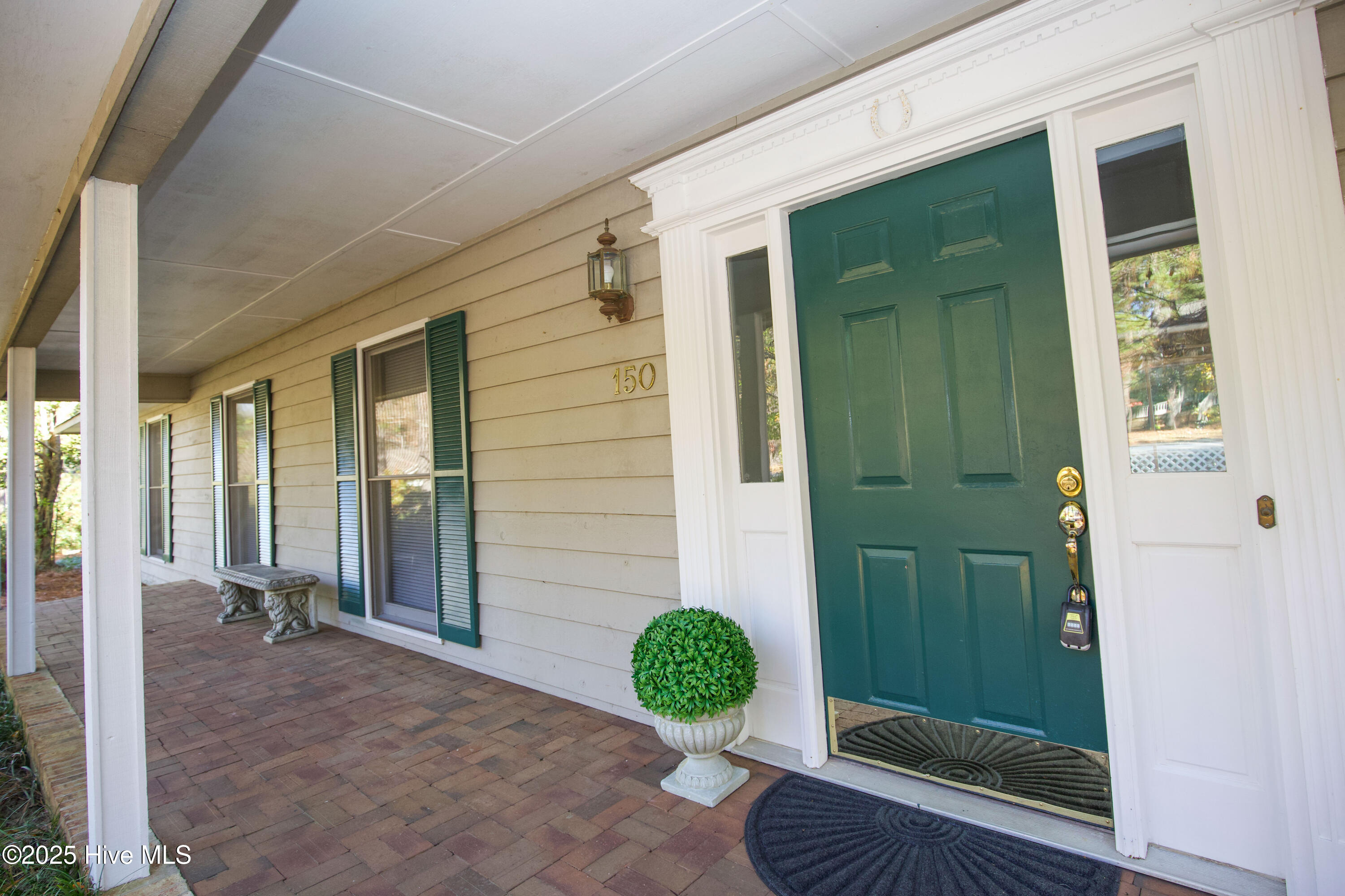 150 Pebble Beach Place Southern Pines, NC 28387 - Photo 34 of 55 Rocking chair front porch overlooks the quiet cul-de-sac.