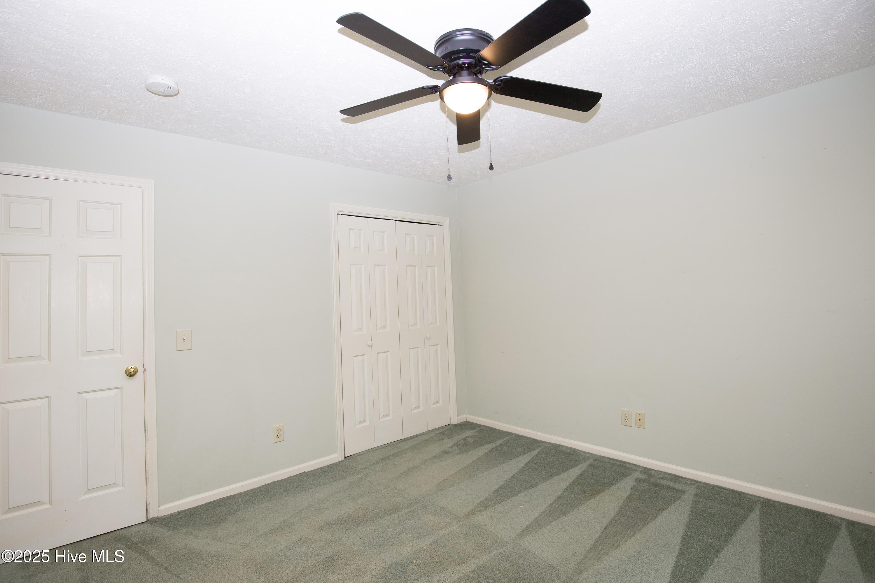 150 Pebble Beach Place Southern Pines, NC 28387 - Photo 42 of 55 Bedroom 3 with new ceiling fan & blinds