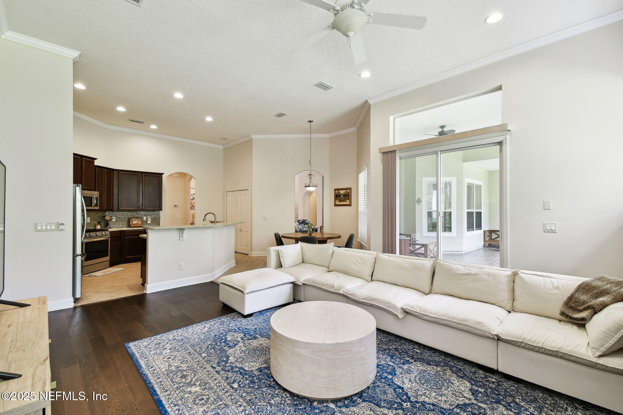 6003 Shadehill Road Jacksonville, FL 32258 - Photo 14 of 46 a living room with furniture and a view of kitchen