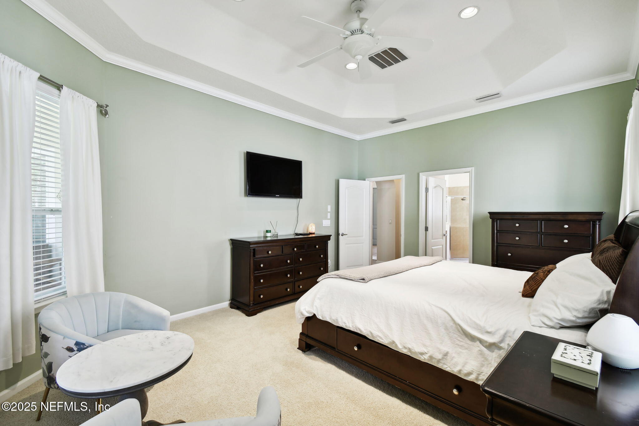 6003 Shadehill Road Jacksonville, FL 32258 - Photo 23 of 46 a bedroom with a bed and a television