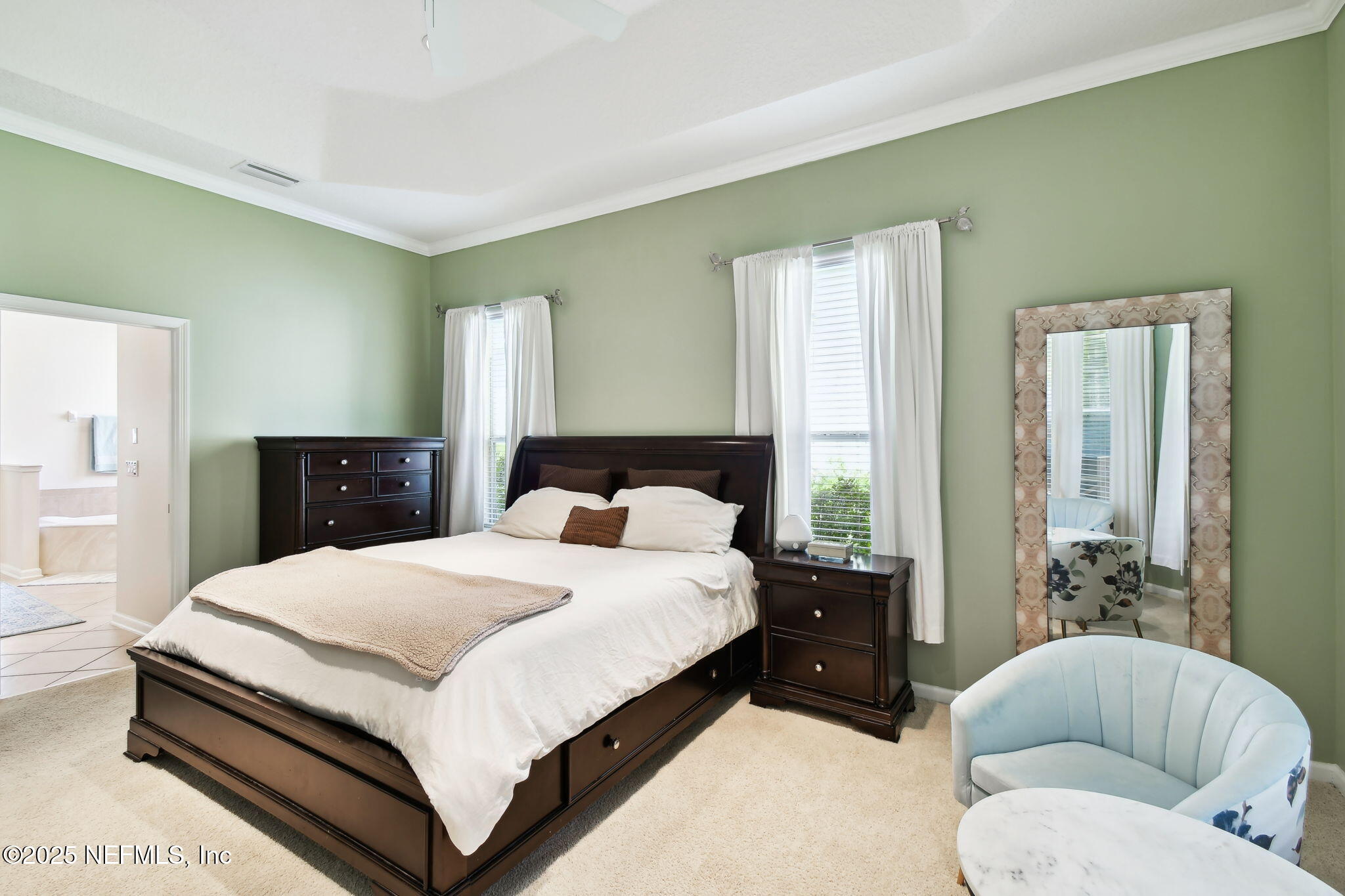 6003 Shadehill Road Jacksonville, FL 32258 - Photo 24 of 46 a bedroom with a bed couch and window