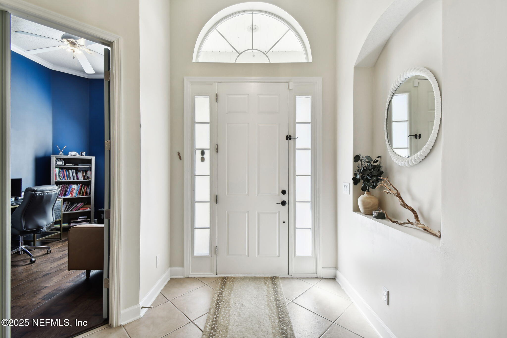6003 Shadehill Road Jacksonville, FL 32258 - Photo 3 of 46 a view of a entryway door with wooden floor