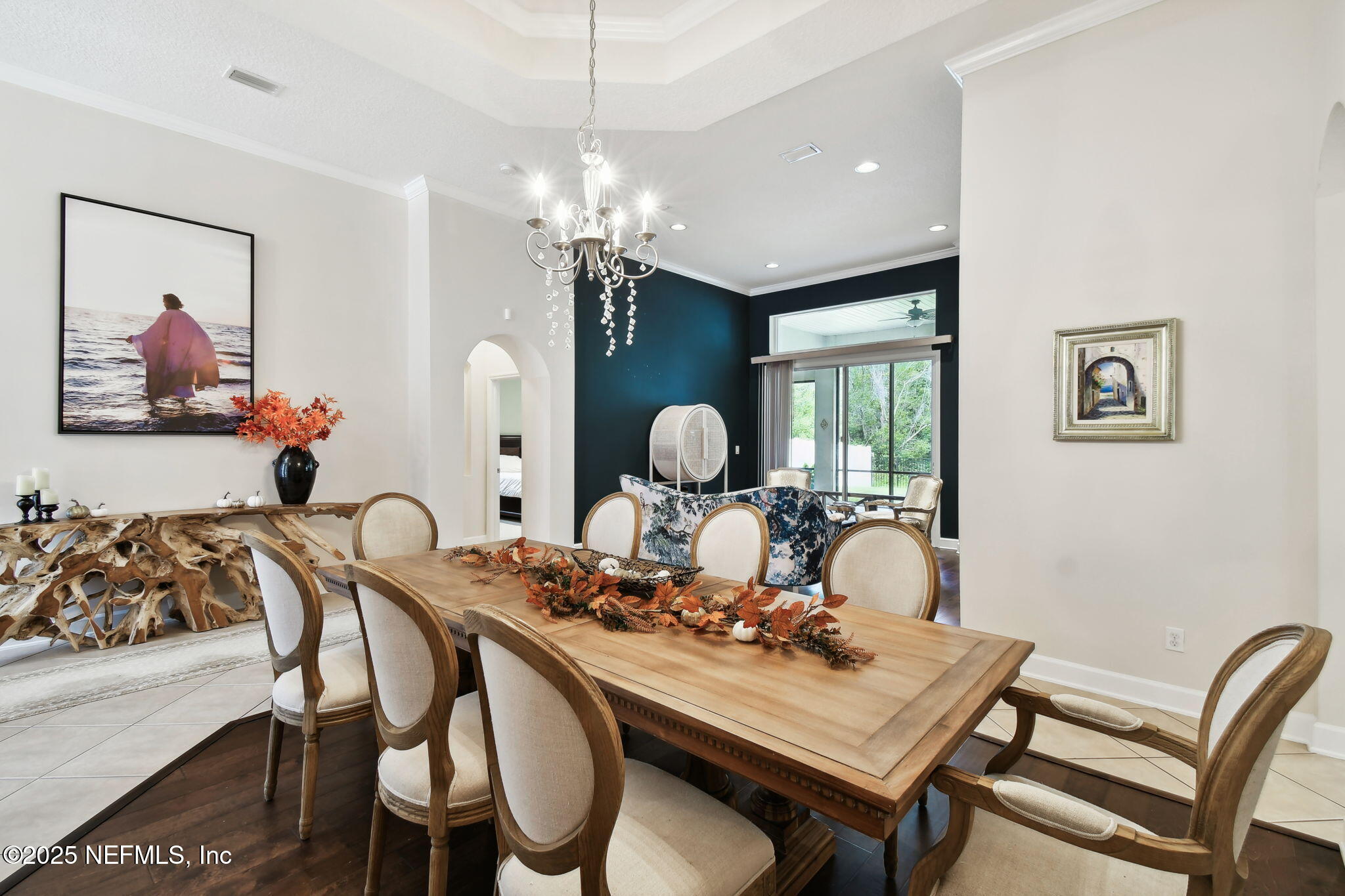 6003 Shadehill Road Jacksonville, FL 32258 - Photo 5 of 46 a view of a dining room with furniture chandelier and a chandelier
