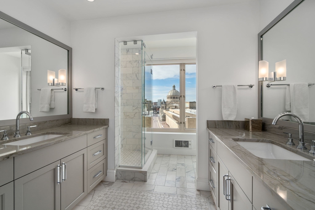 100 Belvidere Street, Unit 7A Boston, MA 02199 - Photo 24 of 33 a bathroom with a granite countertop sink mirror and double