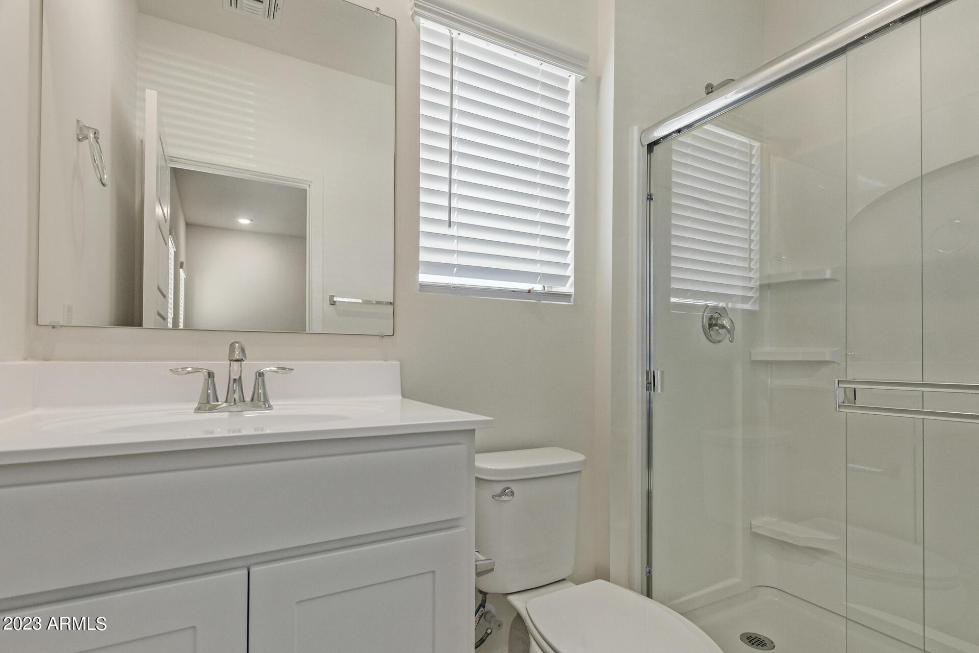 2280 West Laurie Lane Phoenix, AZ 85021 - Photo 12 of 27 a bathroom with a sink toilet and shower