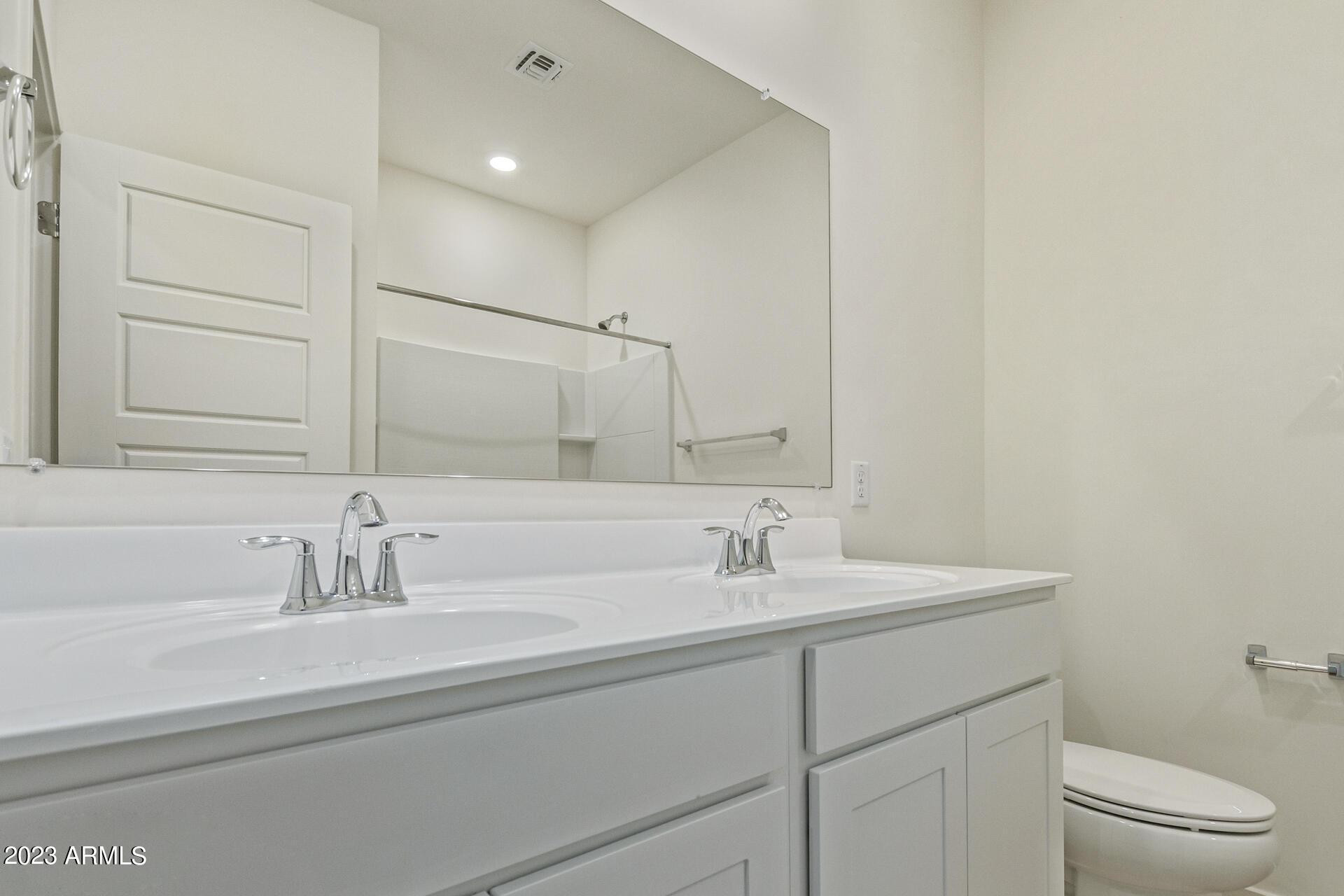 2280 West Laurie Lane Phoenix, AZ 85021 - Photo 18 of 27 a bathroom with a sink and a toilet
