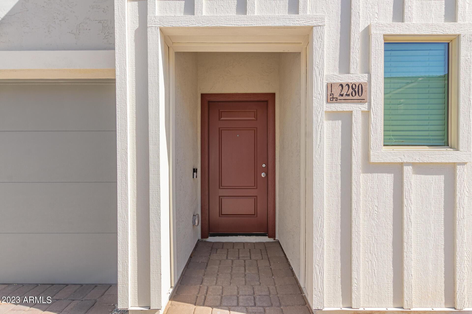 2280 West Laurie Lane Phoenix, AZ 85021 - Photo 2 of 27 a view of a entryway door with wooden floor