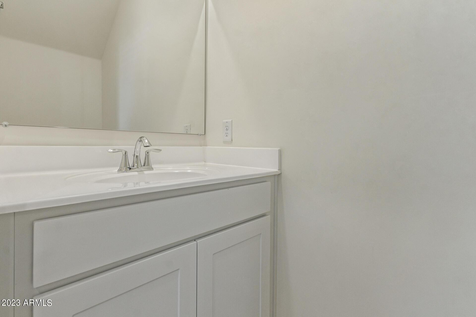 2280 West Laurie Lane Phoenix, AZ 85021 - Photo 22 of 27 a bathroom with a sink and a mirror