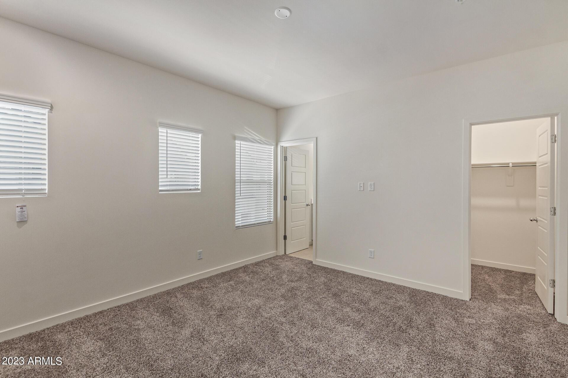 2280 West Laurie Lane Phoenix, AZ 85021 - Photo 9 of 27 an empty room with windows