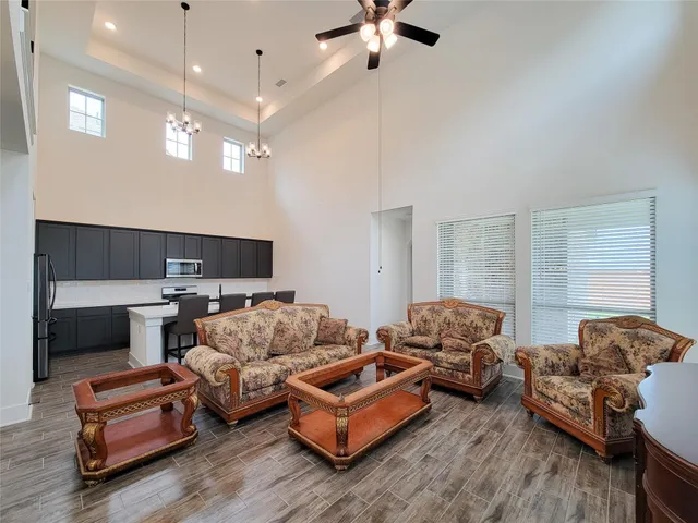 a view of entryway dining room and hall with wooden floor