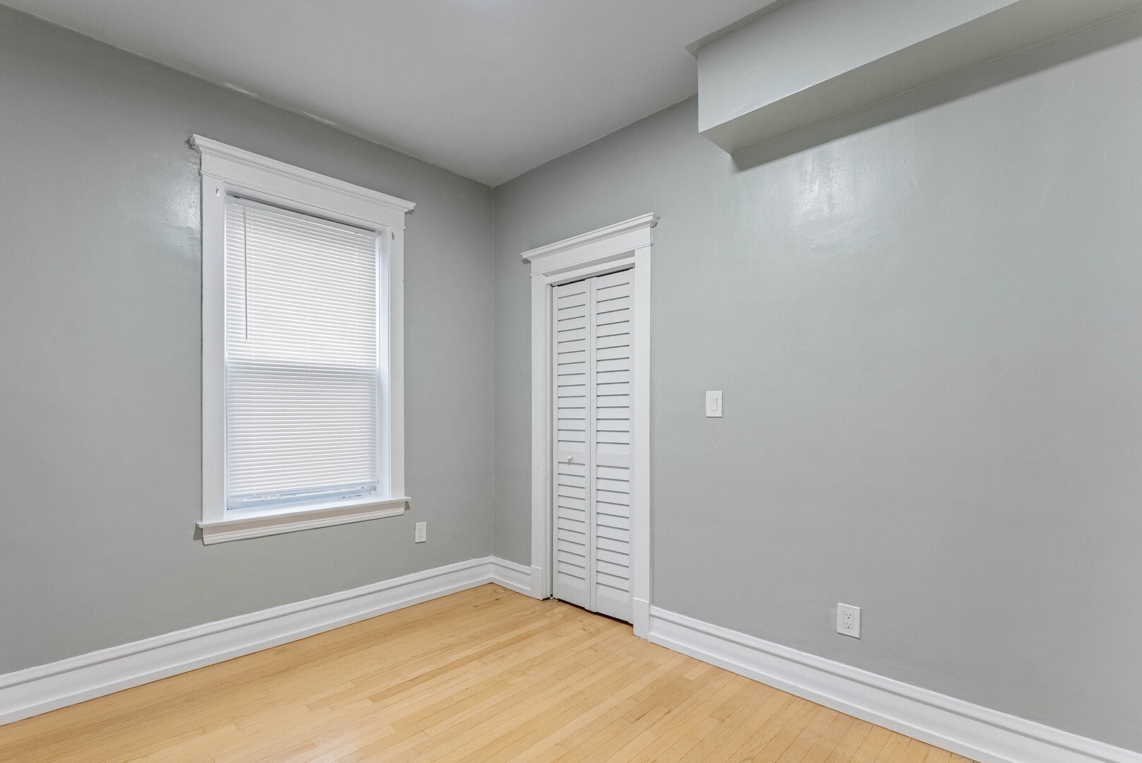 4200 West 21st Place, Unit 2F Chicago, IL 60623 - Photo 5 of 19 a view of an empty room with a window