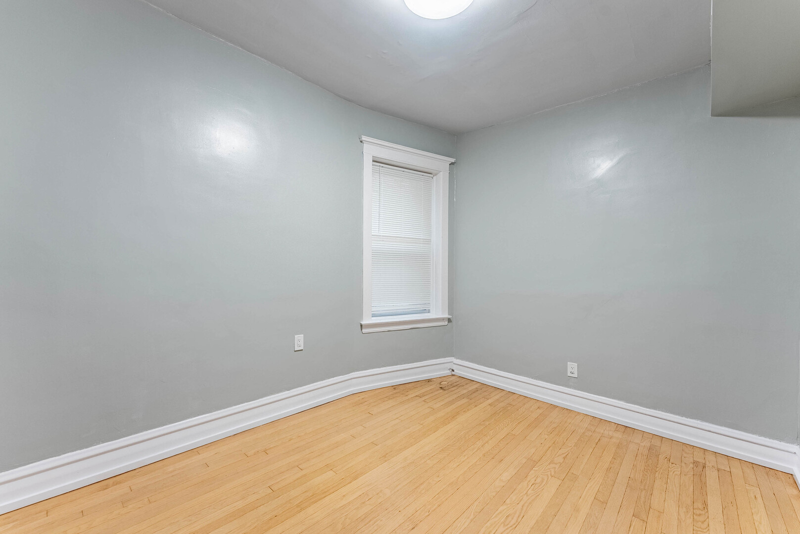 4200 West 21st Place, Unit 2F Chicago, IL 60623 - Photo 8 of 19 an empty room with a window