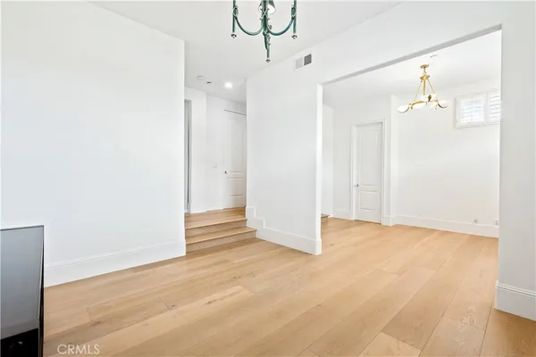 a view of a backyard with swimming pool