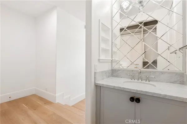 a view of a house with pool and sitting area