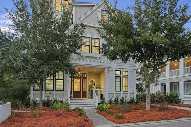 a kitchen with stainless steel appliances a sink and a microwave