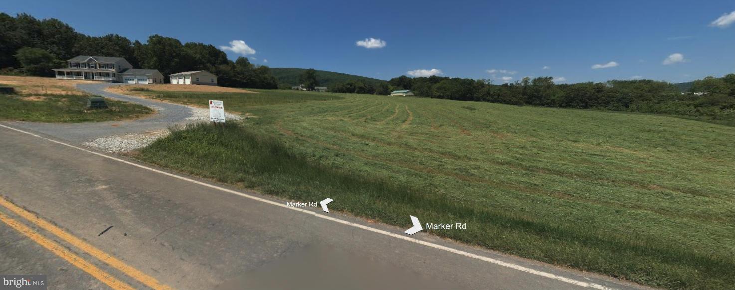 7940 Marker Road Middletown, MD 21769 - Photo 5 of 7 a view of a field of grass and trees