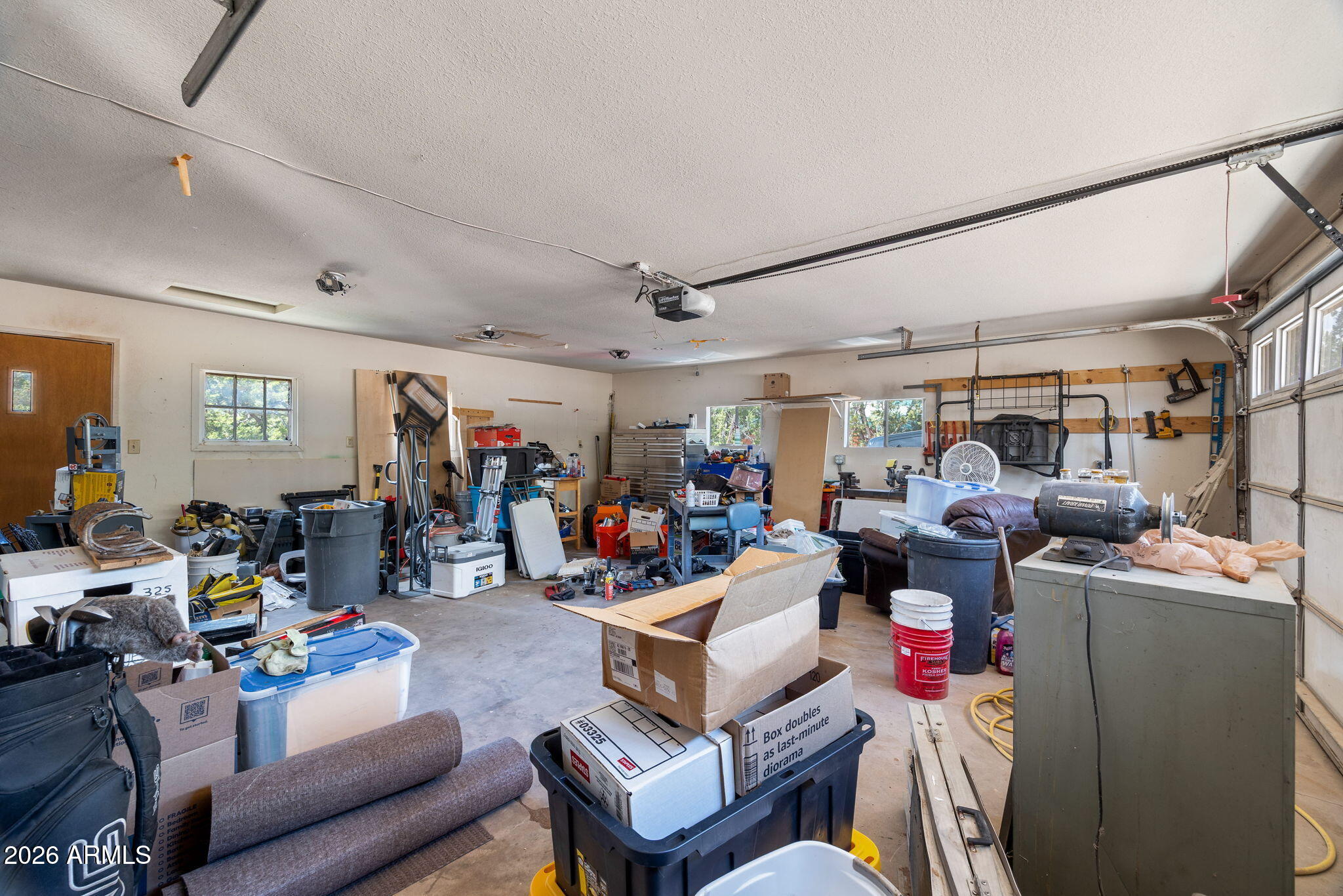 3384 Turkey Run Overgaard, AZ 85933 - Photo 27 of 37 a living room with lots of furniture and gym equipment