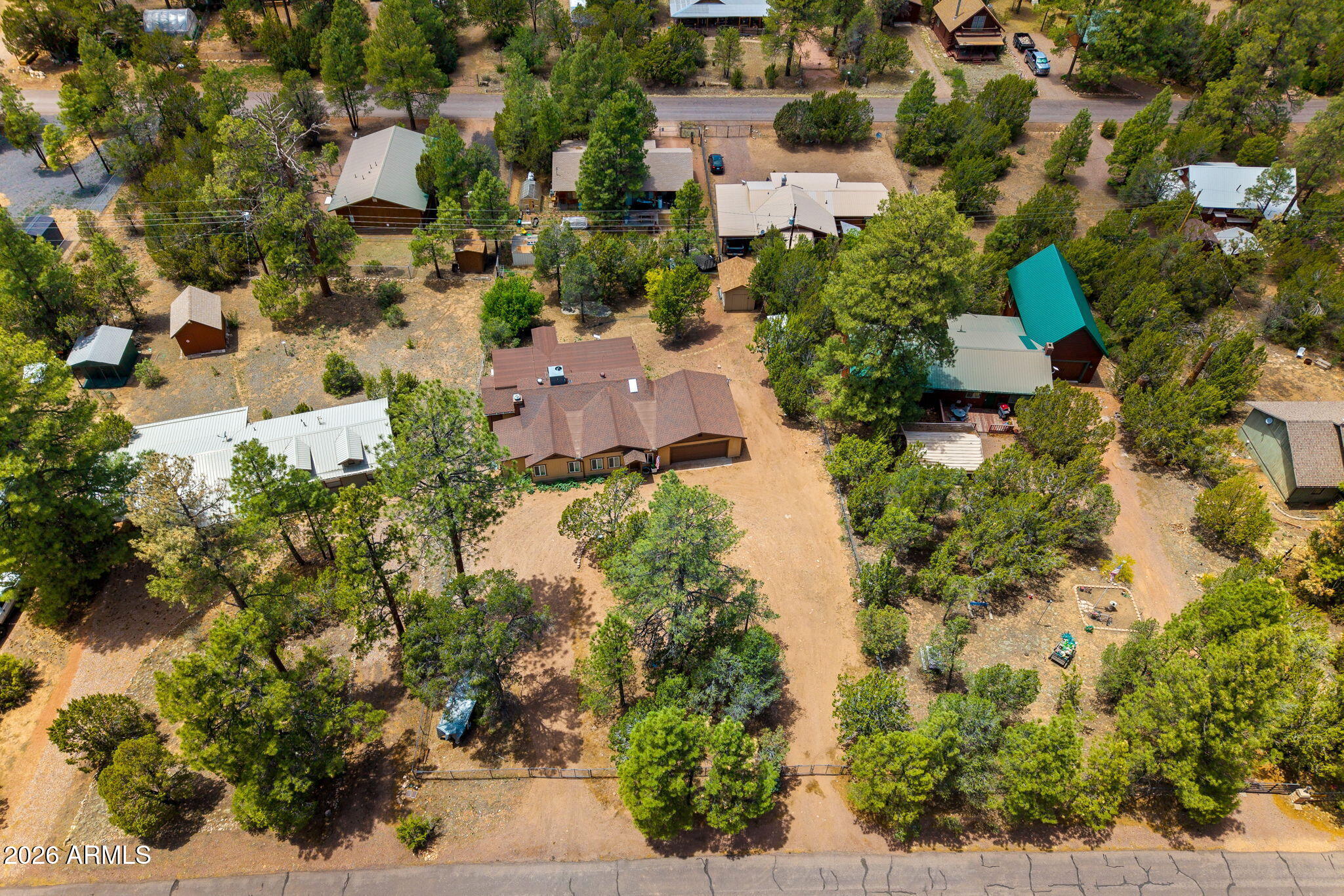 3384 Turkey Run Overgaard, AZ 85933 - Photo 34 of 37 an aerial view of residential houses with outdoor space and trees