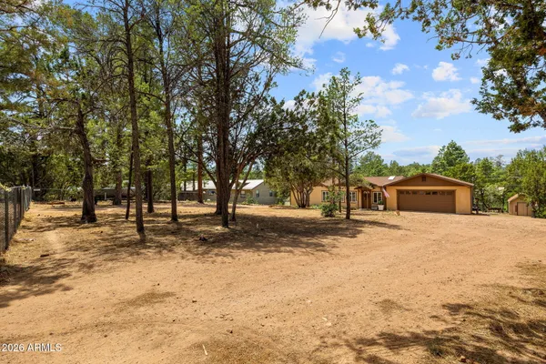 a house with trees in front of it