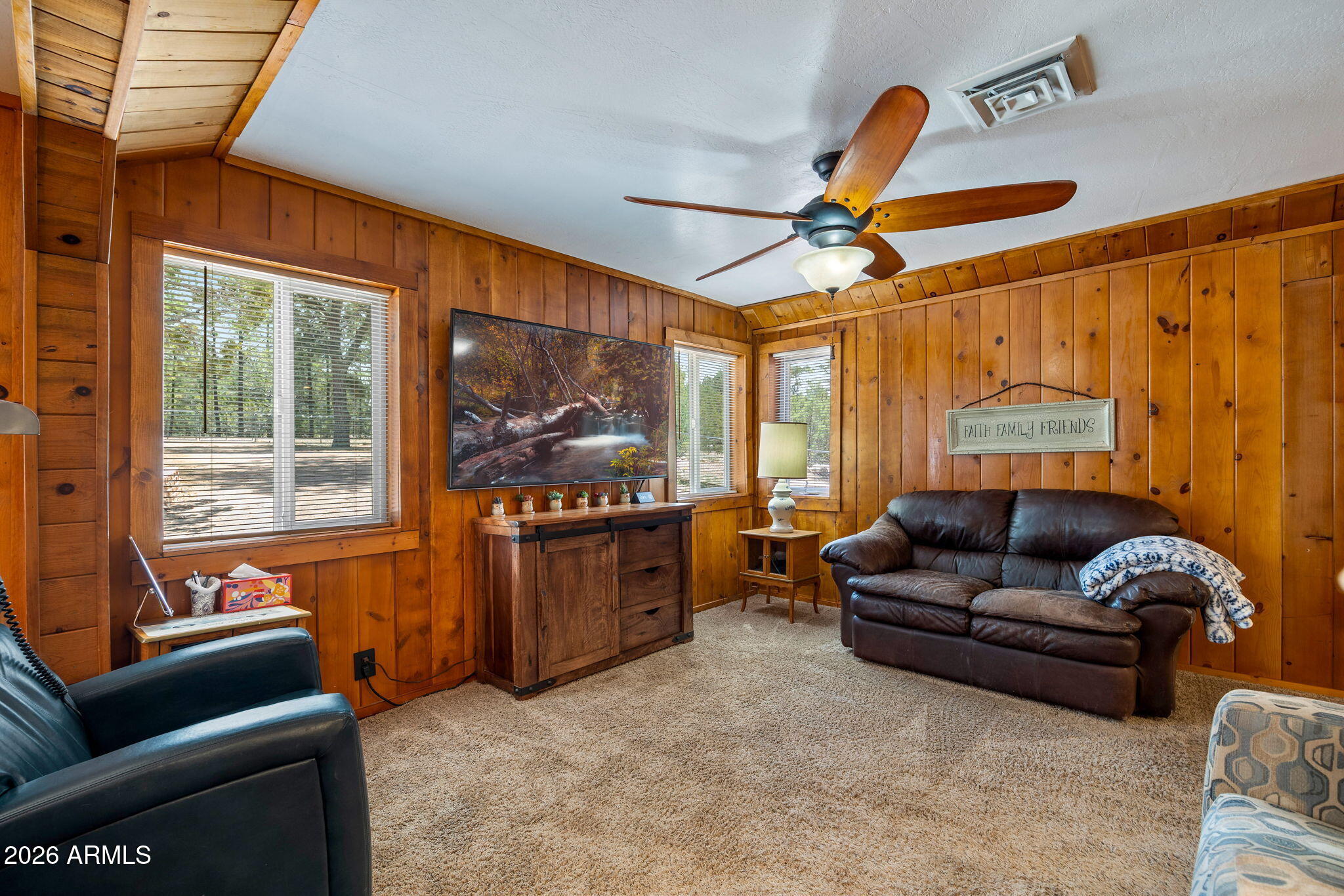 3384 Turkey Run Overgaard, AZ 85933 - Photo 7 of 37 a living room with furniture and a window