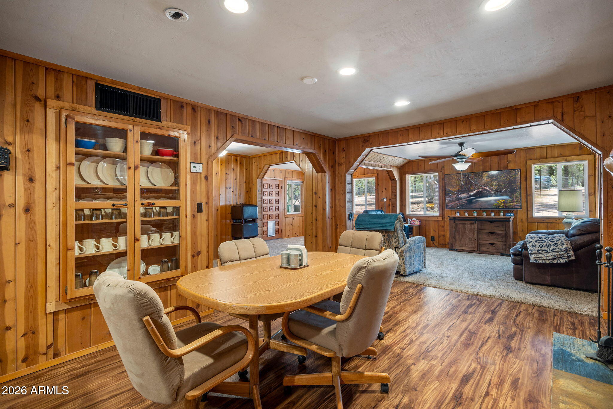 3384 Turkey Run Overgaard, AZ 85933 - Photo 10 of 37 a dining room with furniture and a floor to ceiling window