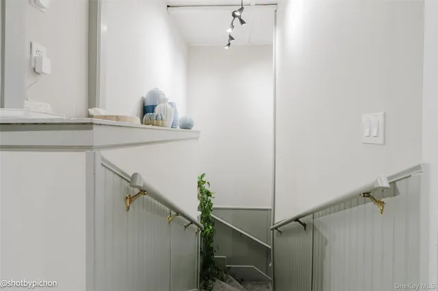 a view of workspace with wooden floor and gym equipment