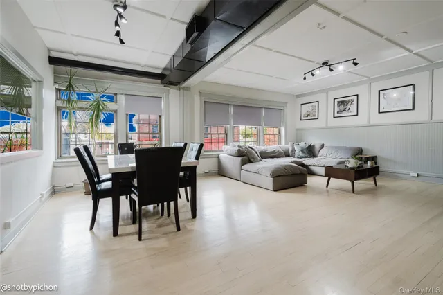 a view of a dining room with furniture