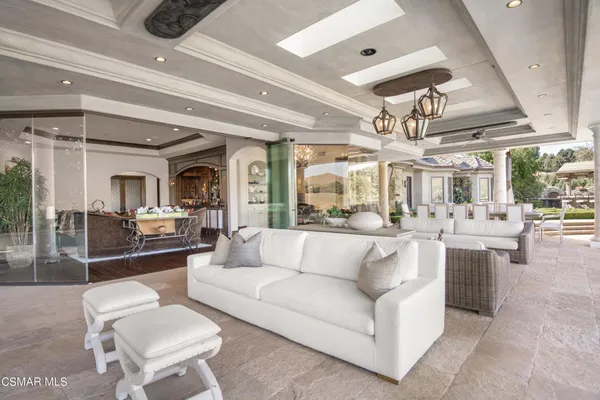 a view of an outdoor dining space with furniture