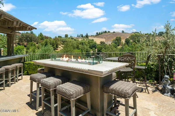 a view of a back yard of the house