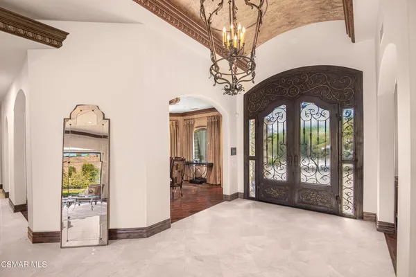 a view of an entryway with a door