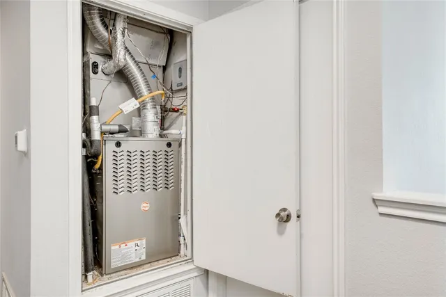 a close view of a utility room with washer and dryer