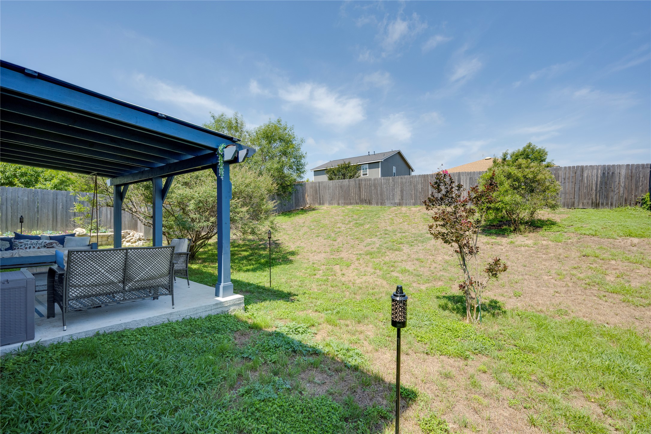 148 Buttercup Way Kyle, TX 78640 - Photo 37 of 40 View of yard featuring an outdoor living space, a patio, and cooling unit