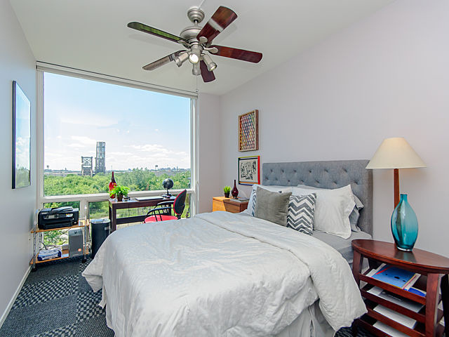 61 West 15th Street, Unit 607 Chicago, IL 60605 - Photo 15 of 23 a bedroom with a bed window and a table