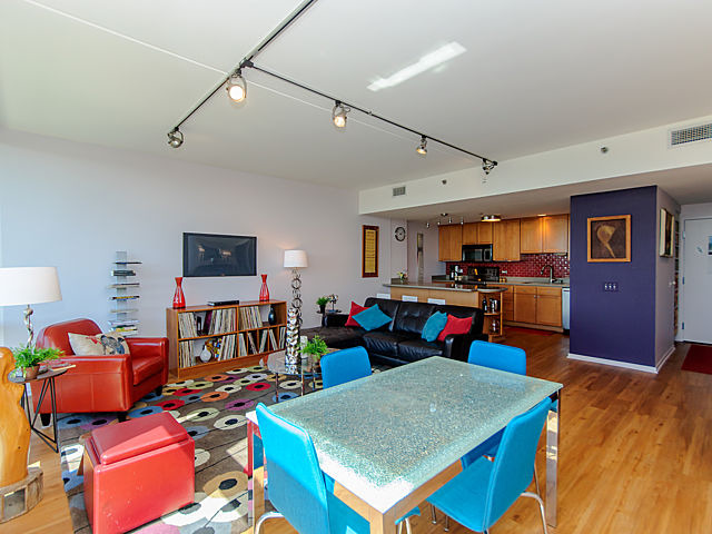 61 West 15th Street, Unit 607 Chicago, IL 60605 - Photo 8 of 23 a living room with lots of furniture