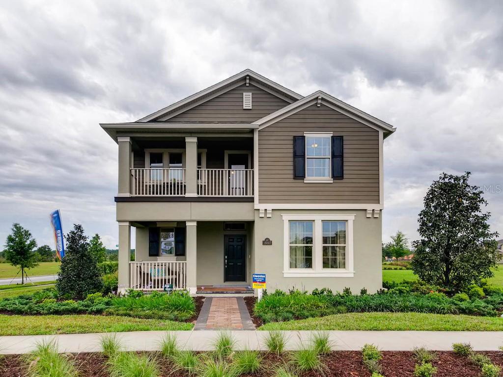 16057 Mangrove Road Winter Garden, FL 34787 - Photo 1 of 1 a front view of a house with a yard