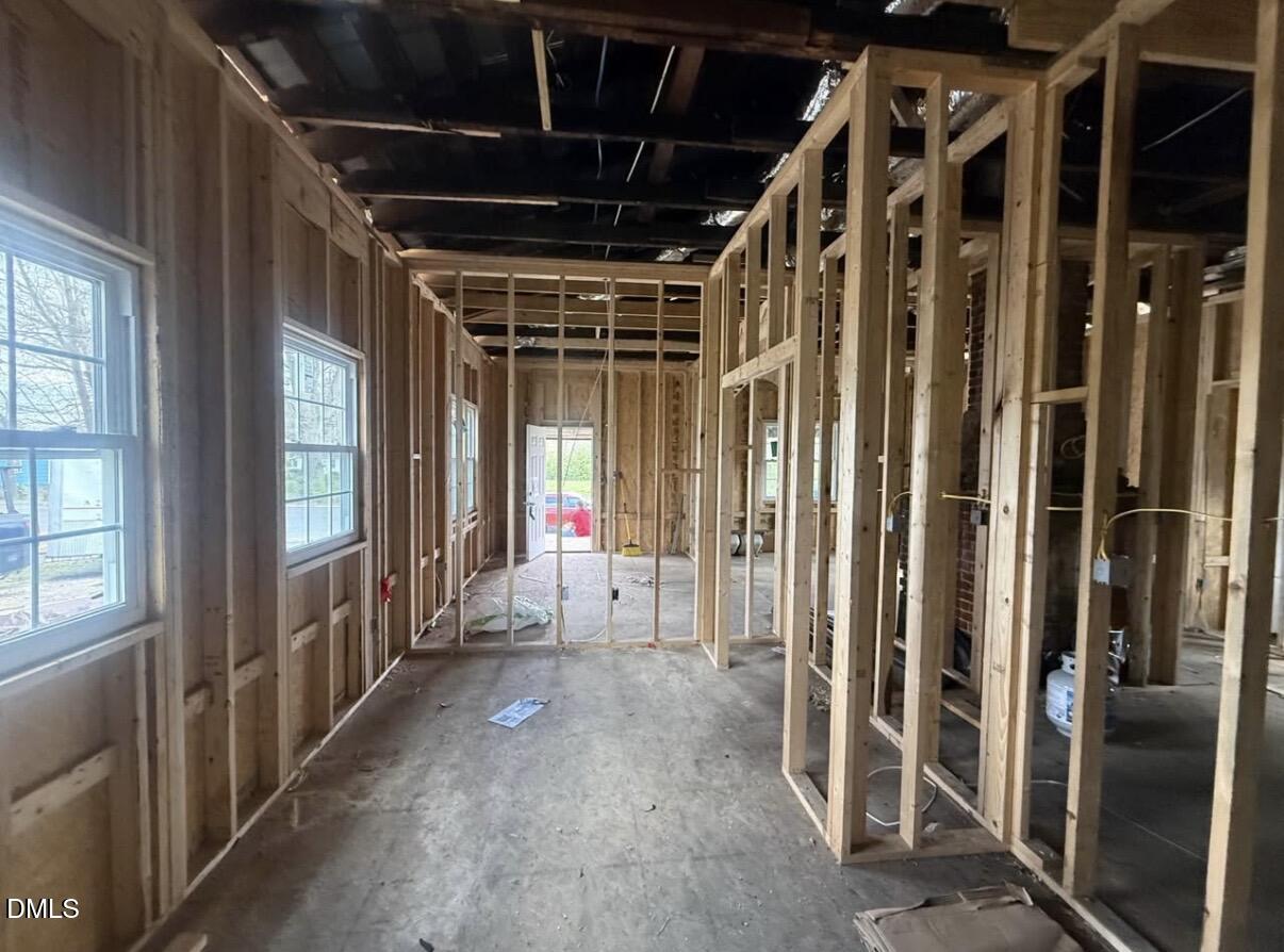 206 South 4th Street Pinetops, NC 27864 - Photo 6 of 10 a view of an empty room with wooden floor and windows