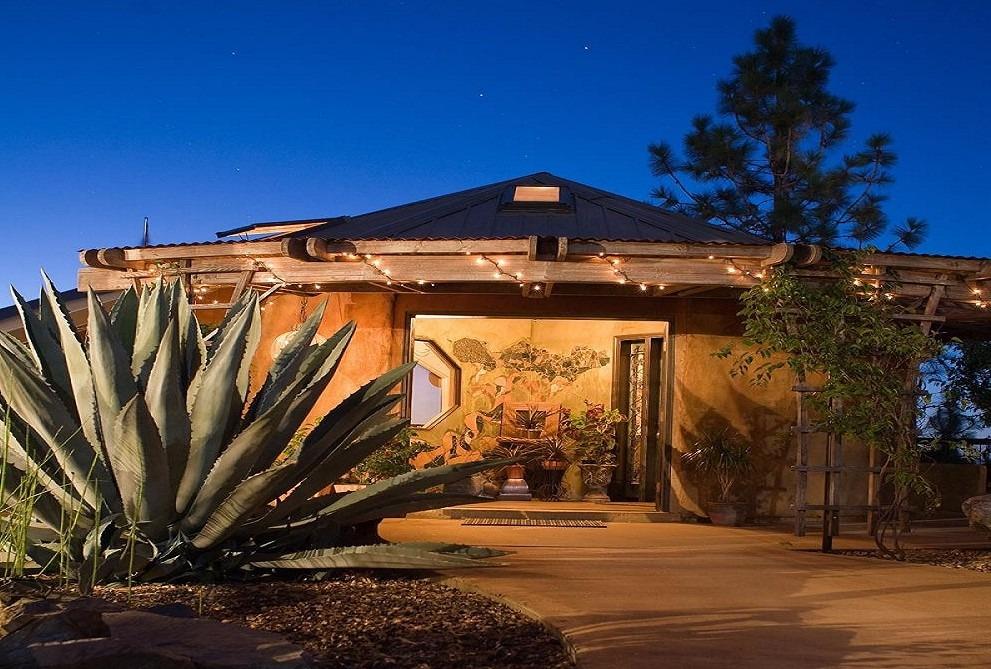 a view of a building with a tree